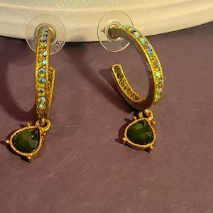 Earrings.  Beautiful gold and emeralds. Not real!!!!